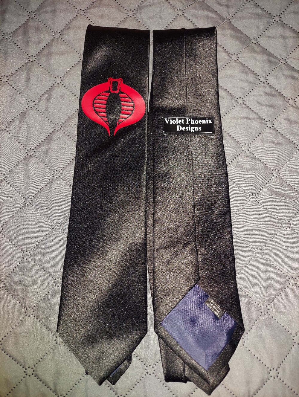 Black Men's Tie with Red Cobra Emblem